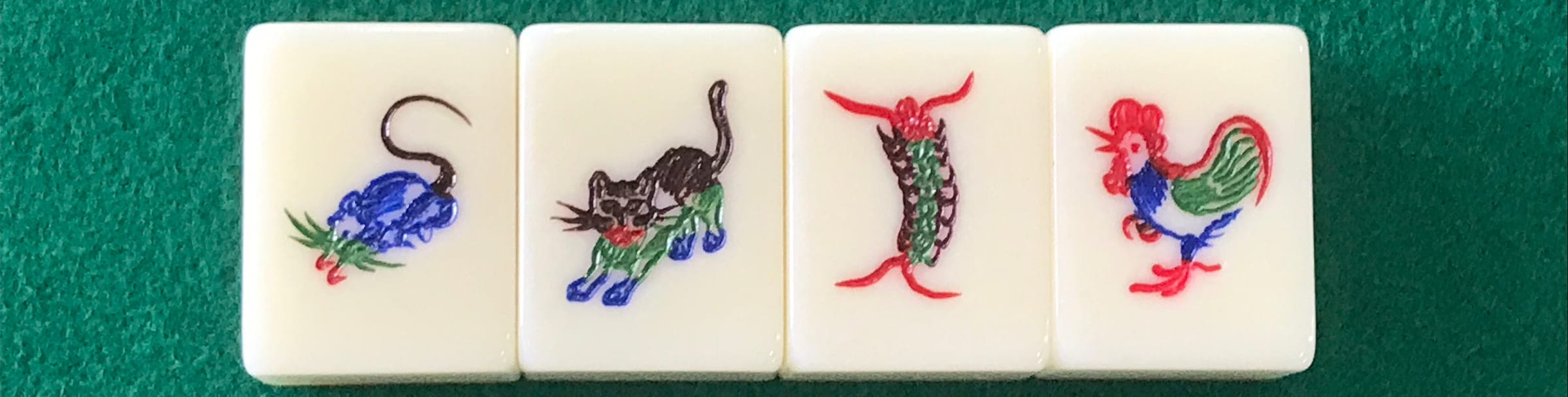 The four animal tiles: rat, cat, centipede and rooster