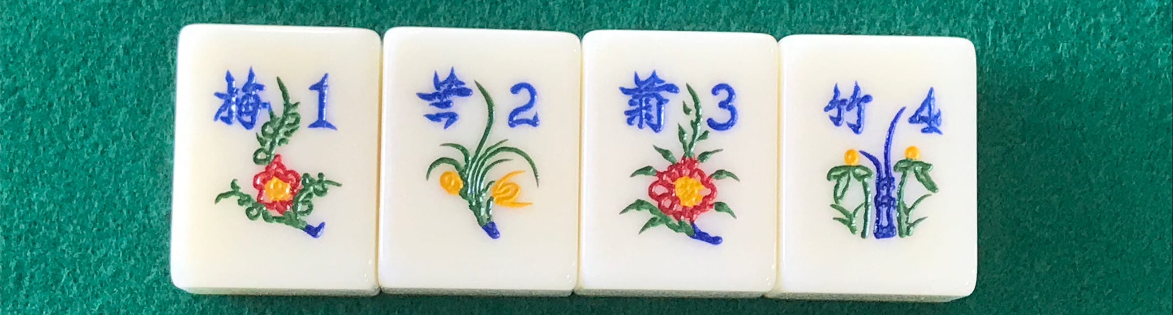 The four blue flower tiles, numbered 1 to 4