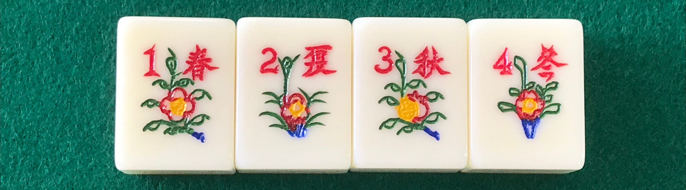 The four red flower tiles, numbered 1 to 4